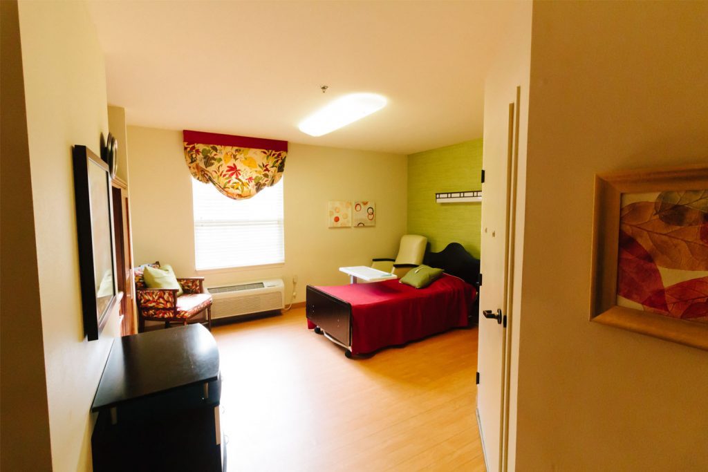 A room available at a long term care, short term care, respite care facility