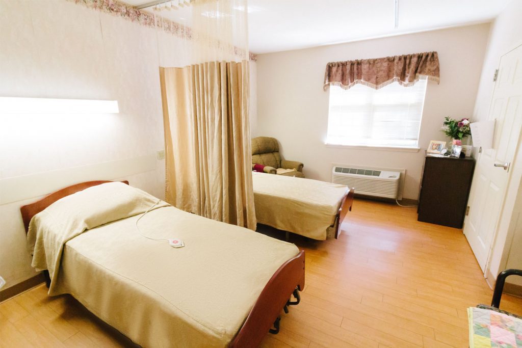A bedroom available for a short term care patient at a skilled nursing facility